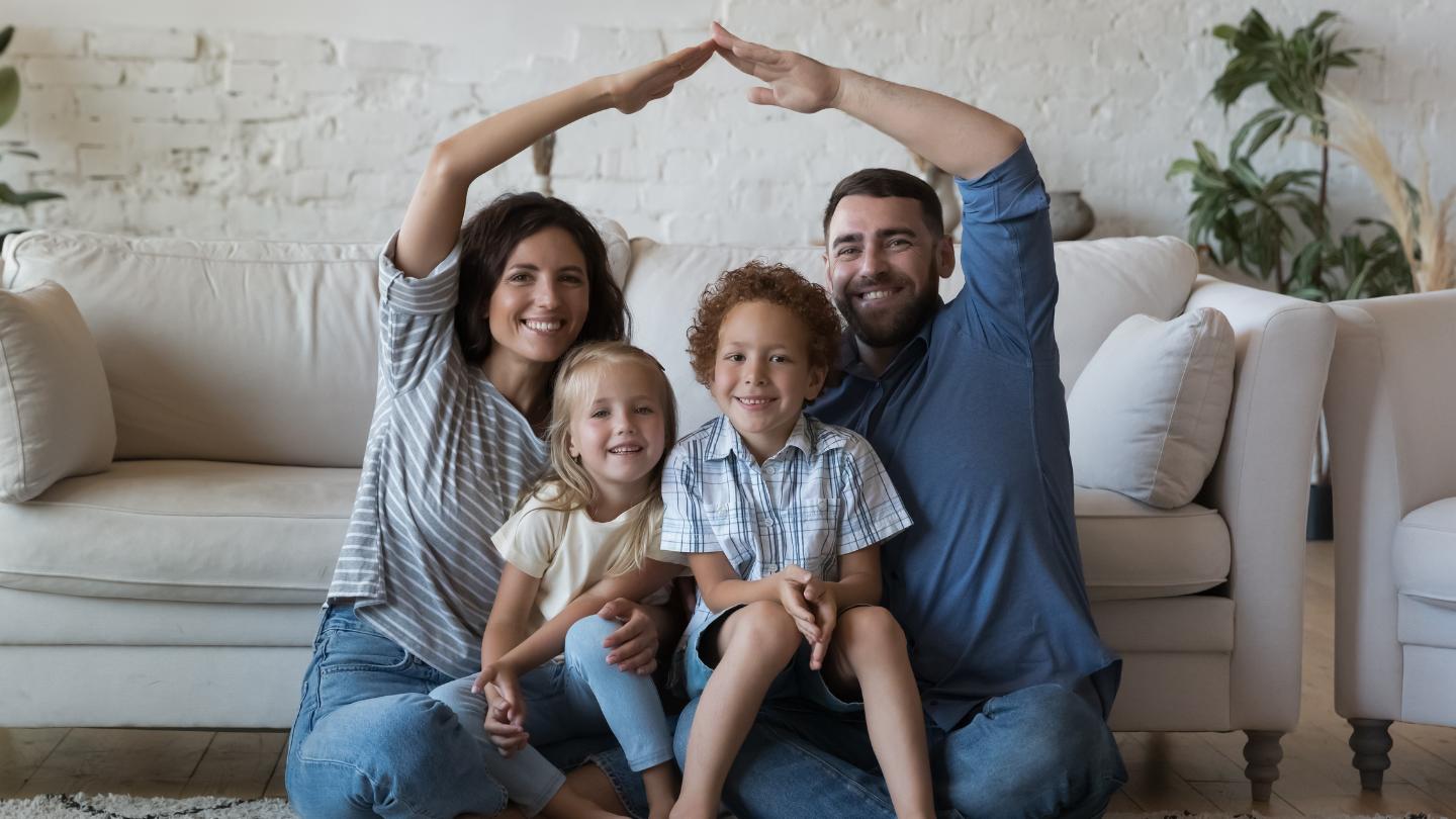 Happy Family Sitting Together 